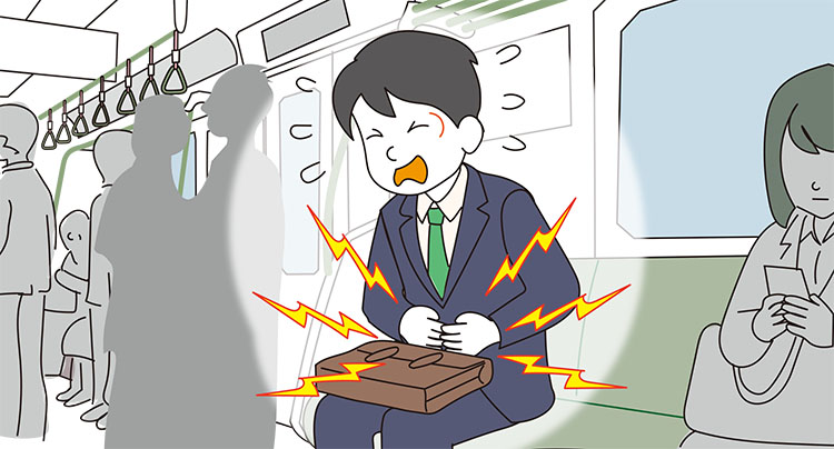図：電車の中でおなかの痛みをこらえる若手男性会社員